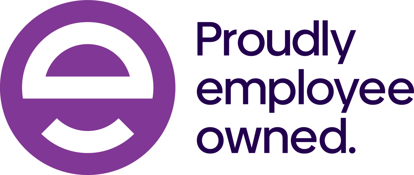 A purple circle with a stylised white e next to bold text reading Proudly employee owned. in dark purple on a black background.