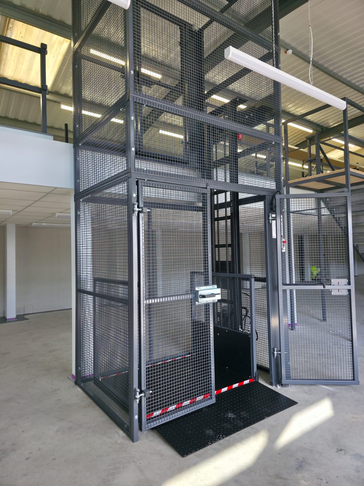 Abstract image with green horizontal lines and geometric shapes overlapping, creating a layered, digital pattern. The lines and shapes intersect at various angles, giving a sense of depth and complexity.